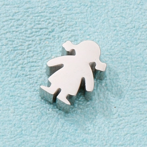 Macro shot of silver cartoon girl locket pendant made of polished stainless steel