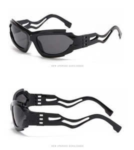 Detail of black futuristic sunglasses with unique wave textured frame and hollowed design