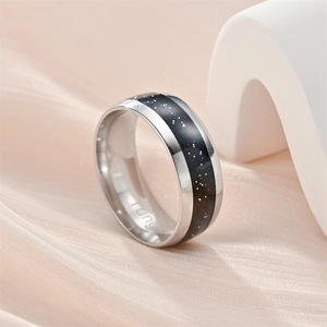 Polished tungsten carbide ring with a black galaxy inlay for men and women