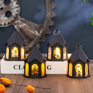 Lot de quatre lanternes d'Halloween noires avec silhouettes de château et sorcière