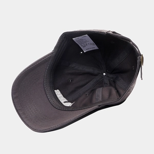 Inside view of a premium dark grey cotton baseball cap with adjustable metal buckle strap