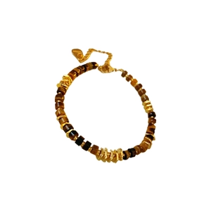 Tiger eye stone bracelet with golden metal accents and adjustable chain extension