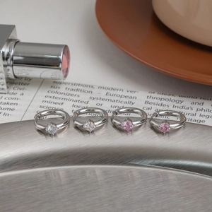 Set of four stainless steel huggie earrings with clear and pink zircon stones