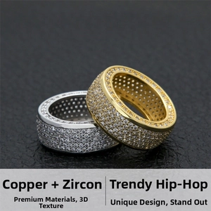 Detailed close-up showing gold and silver iced-out copper rings with AAA cubic zirconia stones