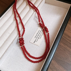 Elegant double-layered red beaded necklace with vintage agate beads and metallic spacers