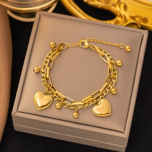 Double-layered 18k gold plated stainless steel bracelet with heart pendants and beads