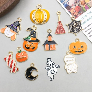 Set of 11 Halloween enamel charms featuring pumpkins, ghosts and witch hats for DIY jewelry