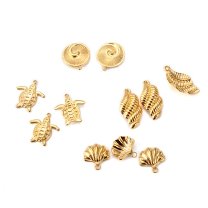 Golden stainless steel ocean pendants featuring sea turtle, seashell and conch charms