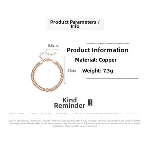 Detail view of double-row rhinestone chain in rose gold copper with lobster clasp and extension