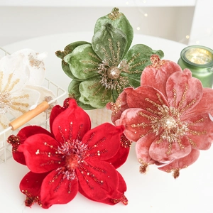 Elegant velvet artificial magnolia flowers in red and gold for Christmas home decor