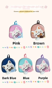 Detailed group view of five colorful hard shell cartoon cat backpacks with plush tails