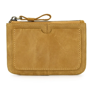 Detailed view of brown genuine leather coin purse with external card slot and zipper
