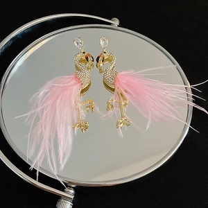 Pink feather flamingo earrings in gold finish with sparkling crystals on mirror