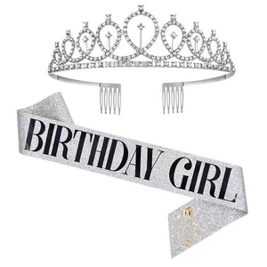 Detail view of silver birthday girl sash with black lettering and sparkling rhinestone crown