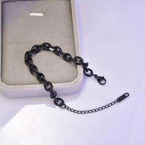 Detail of black plated chunky stainless steel chain bracelet with adjustable clasp