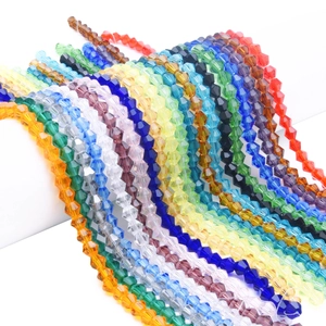 Macro view of multi-color faceted bicone crystal beads for DIY jewelry making and crafts