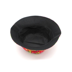 Unisex flat top wide brim bucket hat with red floral print and black lining