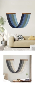 Detail of bohemian gradient fringe tapestry with wooden rod for wall decor