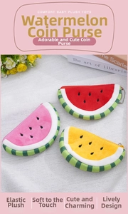 Close-up of colorful watermelon plush coin purses in red, pink, and yellow with soft texture
