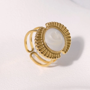 Detail of 18K gold plated vintage ring with white rose relief and adjustable band