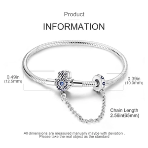 Detailed view of silver Hamsa Hand safety chain charm with blue stone on snake chain