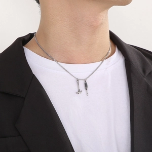 Silver mini tool pendant necklace featuring a hammer and screwdriver for men