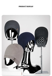 Detailed display of four multi-color winter knitted beanies on silver chrome mannequins