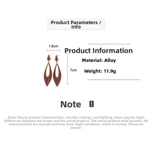 Macro view of teardrop alloy earrings in brown with precise 1.8cm x 7cm dimensions