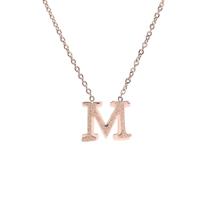 Elegant rose gold titanium steel necklace featuring a matte finish letter M pendant