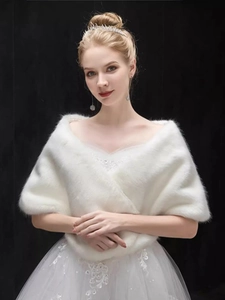 Elegant white faux fur bridal shawl showing soft plush texture for wedding dresses