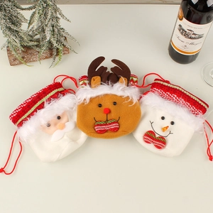 Christmas drawstring gift bags featuring Santa, reindeer, and snowman in plush velvet