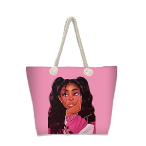 Détail du cabas en toile rose avec poignées en corde de coton et illustration de femme