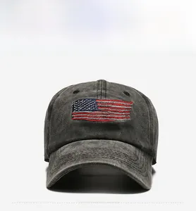 Close-up of the USA embroidery and American flag on this washed grey cotton baseball cap