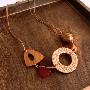 Bohemian rattan circle and wood pendant necklace with warm resin beads for women