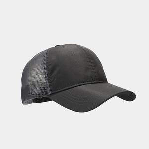 Close-up of charcoal gray mesh golf cap featuring breathable honeycomb fabric and mesh panels