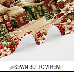 Detail of the sewn bottom hem on a Christmas themed shower curtain with floral patterns