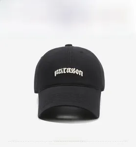Detailed front view of black baseball cap featuring white narason embroidery on cotton