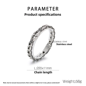 Detail view of retro stainless steel bracelet showing size specs and oxidized textures