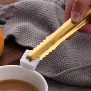 Pince à glaçons en acier inoxydable doré avec bords dentelés pour sucre et café