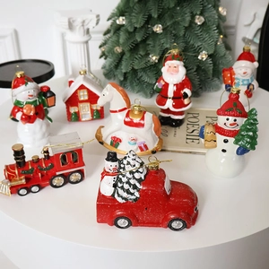 Christmas painted resin ornaments set featuring Santa Snowman and red vintage truck