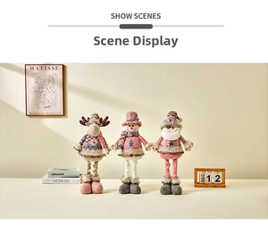 Pink and grey plush Christmas figures set with telescopic legs in cozy home setting