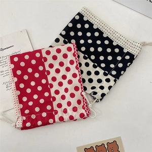 Polka dot drawstring pouches in red and black cotton for jewelry and lipstick storage