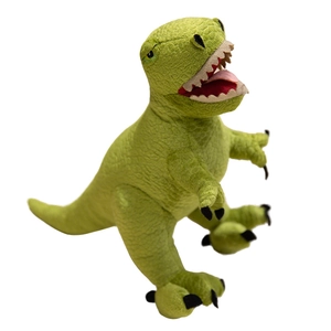Cartoon green Tyrannosaurus Rex plush toy with realistic skin texture on white background