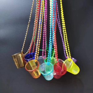 Close-up of colorful translucent plastic beaded necklaces with shot cups for party events