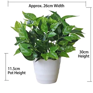 Detail of 30cm faux pothos plant with realistic green leaves in a white ceramic pot