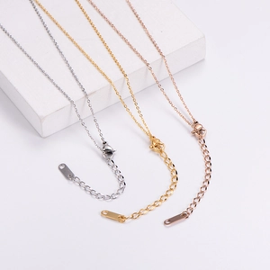 Detailed view of titanium steel necklace lobster clasps in gold silver and rose gold
