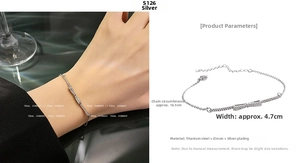 Detailed view of silver titanium steel bracelet featuring a zircon bow tie centerpiece