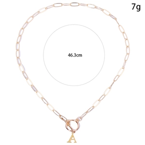 Detailed specs of OT toggle gold letter A necklace showing 7g weight and 46.3cm length