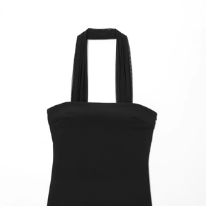 Elegant black halter neck maxi dress with sheer mesh splicing and a minimalist silhouette
