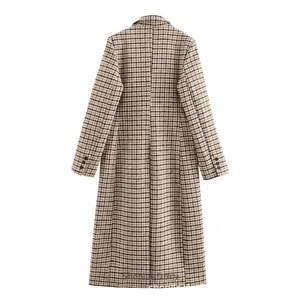 Back view of long slim-fit houndstooth coat with buttoned cuffs and mid-seam detail
